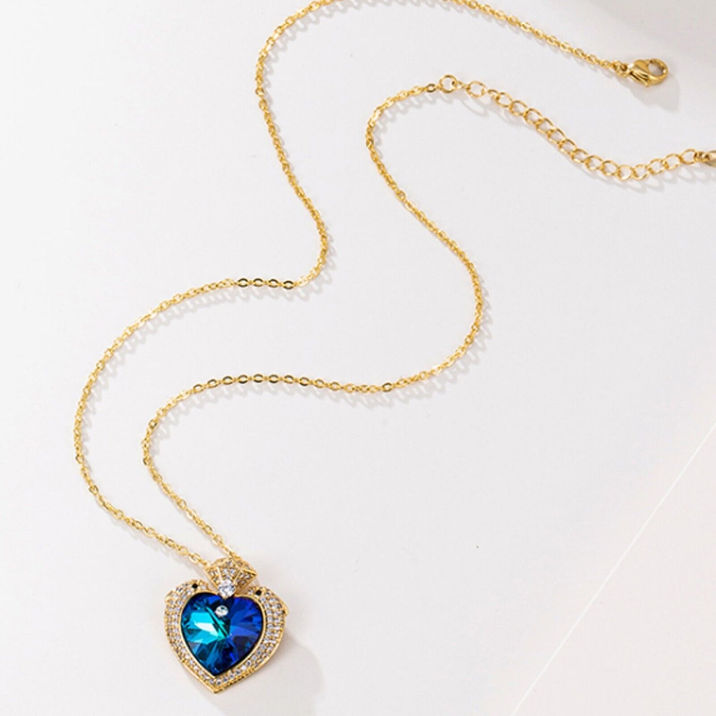 Necklaces - 14K Gold Plated. Blue Crystal Dolphins Heart Pendant & Chain.